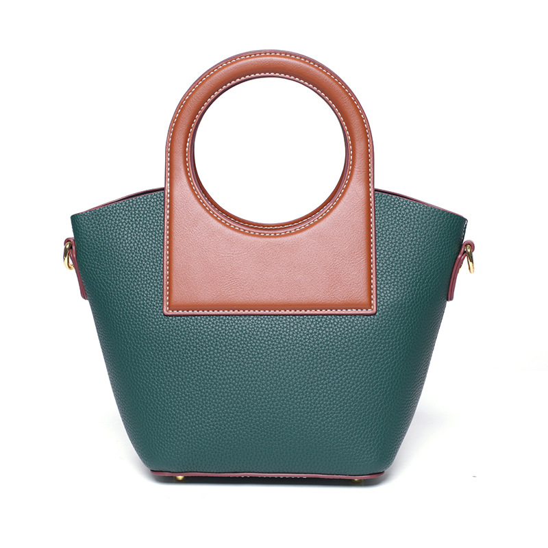 Customized versatile round handle shell bag with niche design, diagonal span bag, elegant and high-end splicing handbag